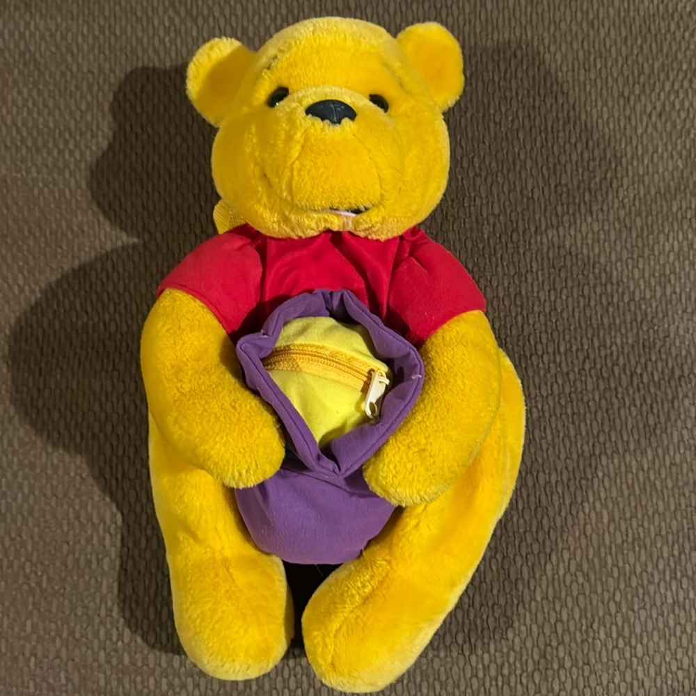Vintage Disney Winnie the Pooh toddler backpack. Blanket and pacifier pockets.